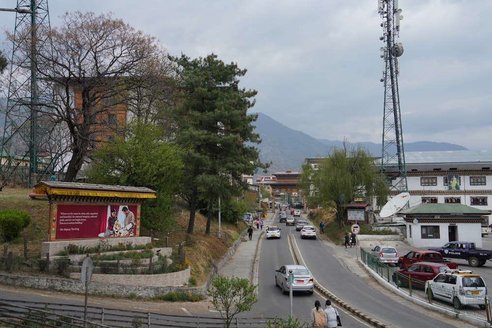 a street with cars and buildings on the side