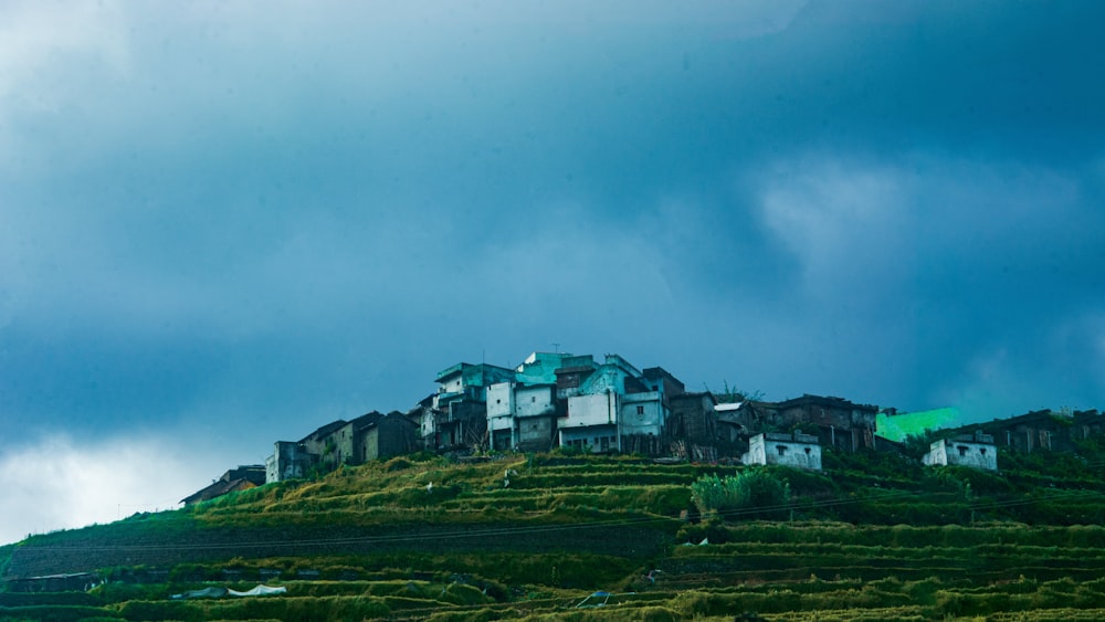 a group of buildings on a hill