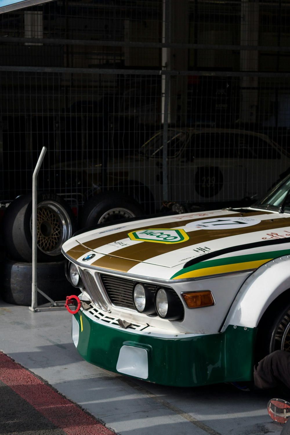 a race car parked in a garage