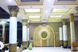 A traditional Ottoman-style majlis setup with low seating and detailed woodwork, perfect for gatherings.