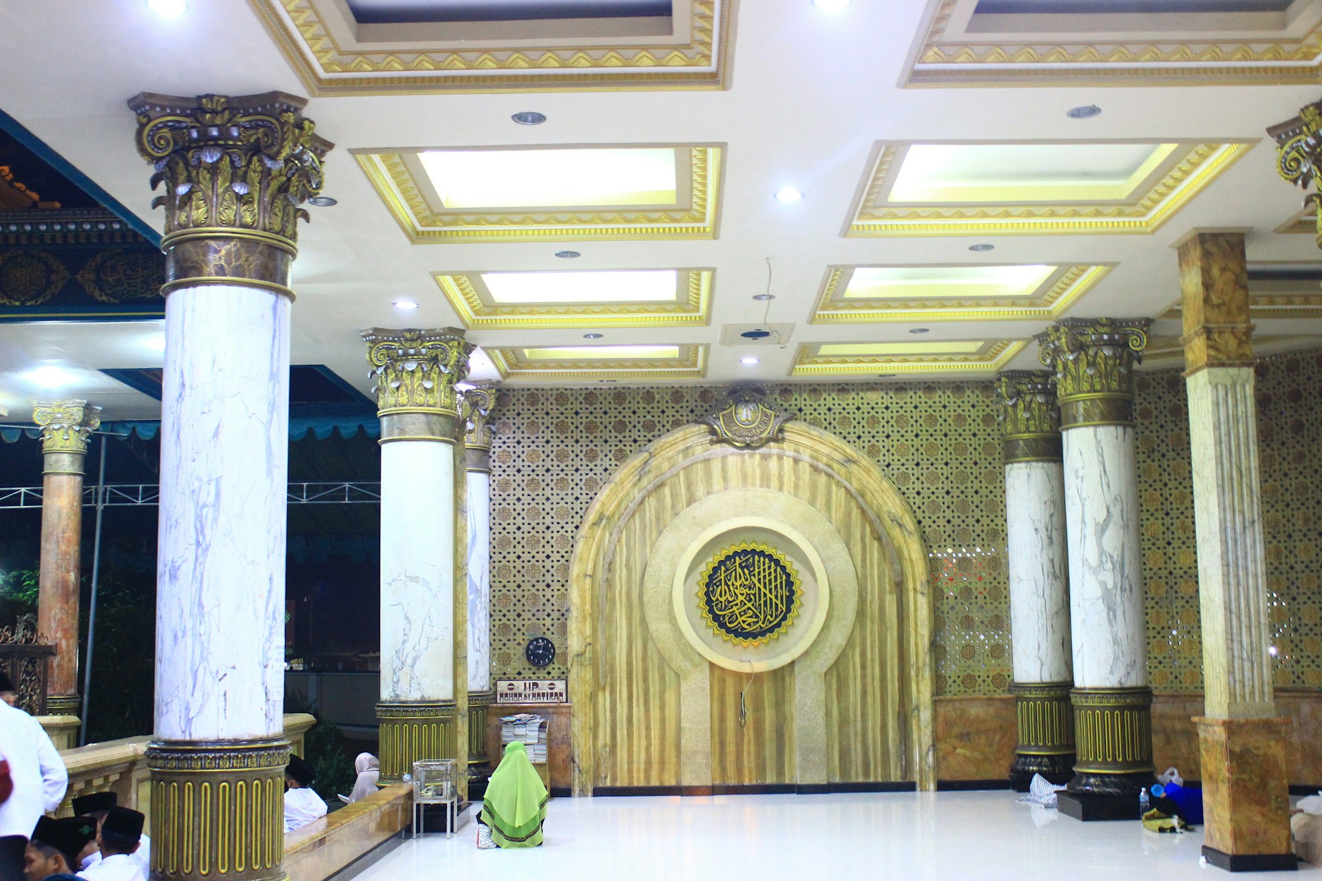 woman wearing yellow long-sleeved dress under white clouds and blue sky during daytime