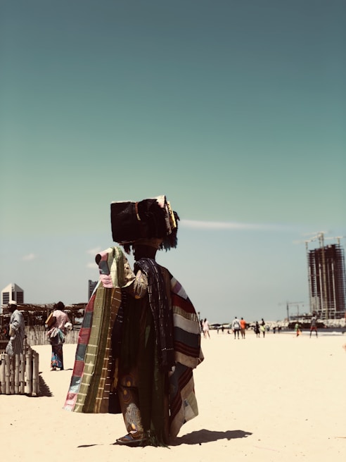 a person in a garment on a beach
