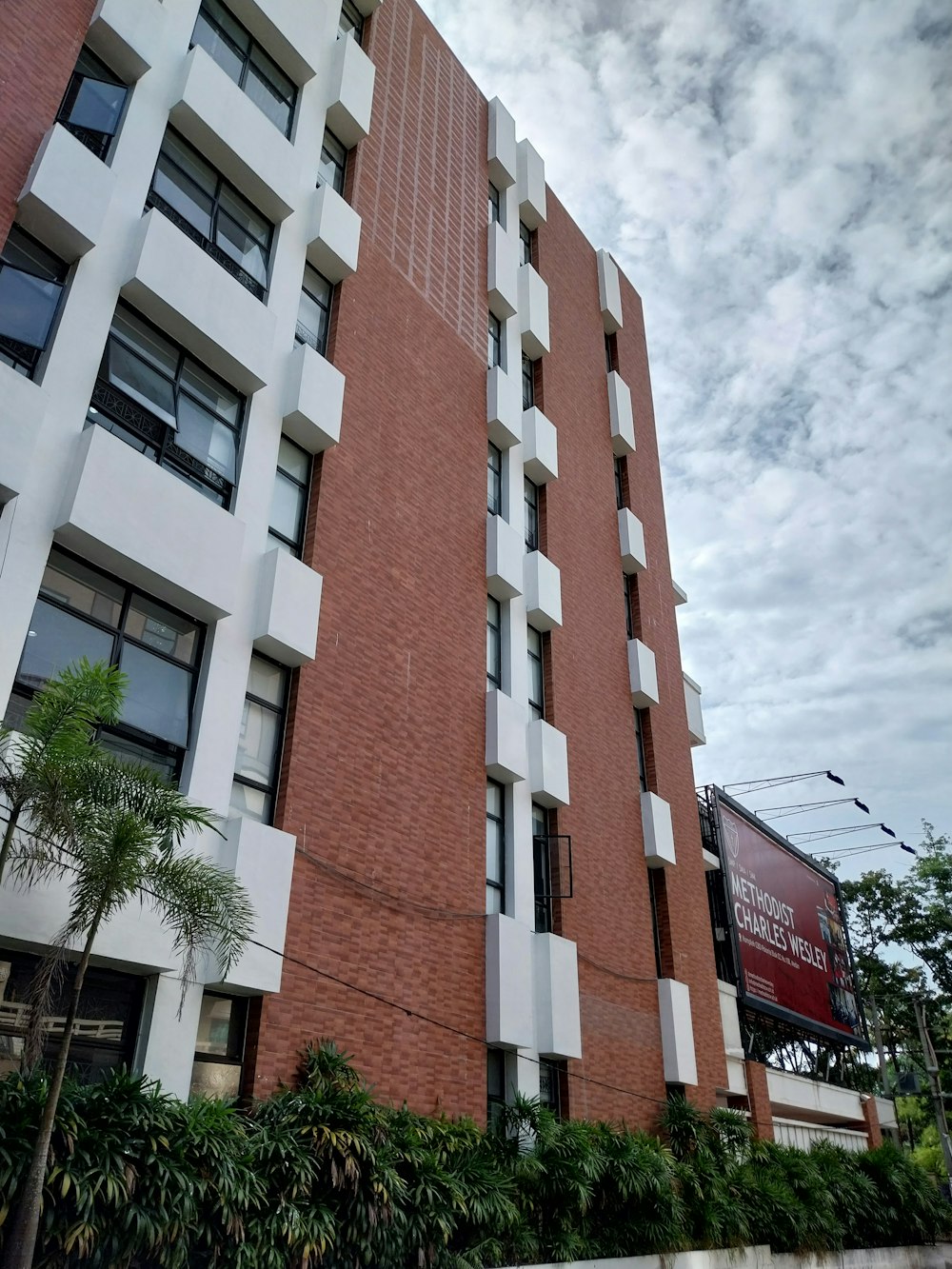 a tall building with a sign on it