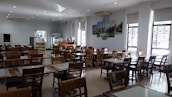 a room with tables and chairs