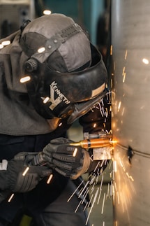 a person wearing a mask and holding a gun