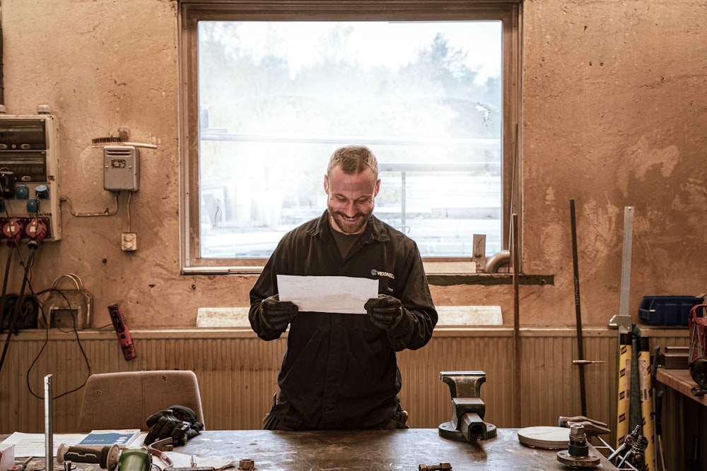 a person holding a piece of paper