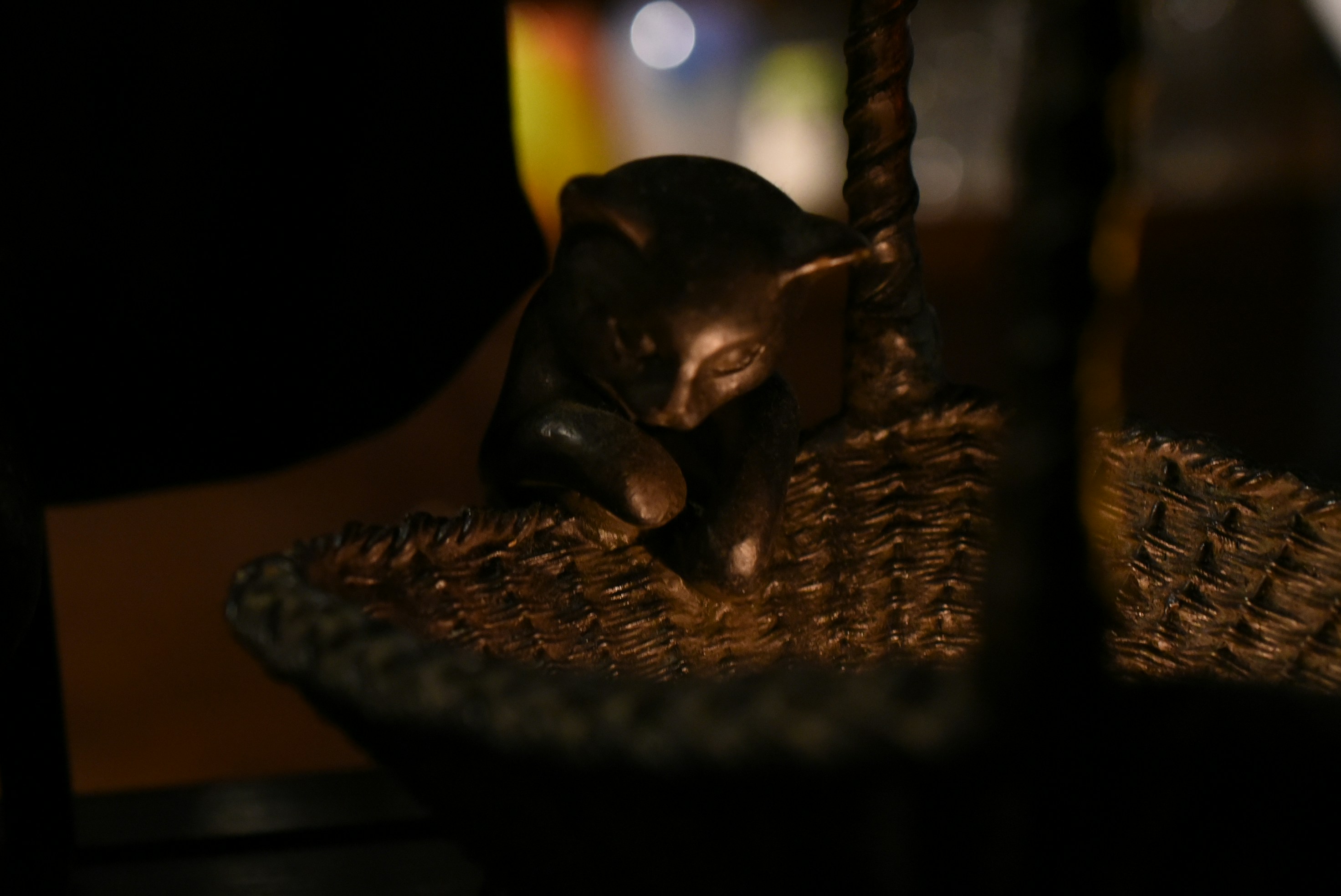 a small elephant in a basket