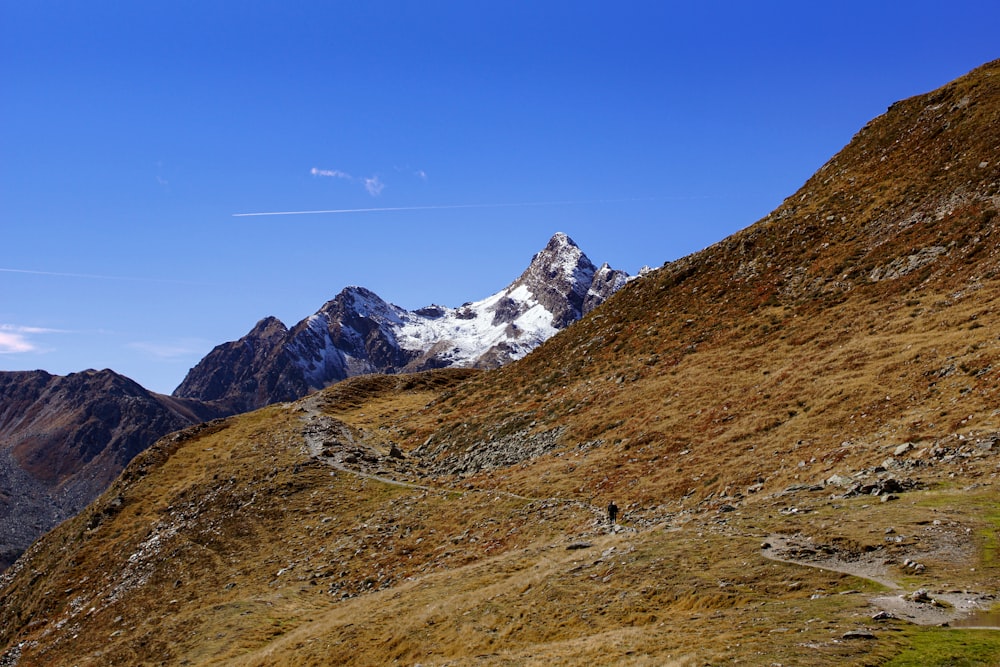 a person walking on a mountain