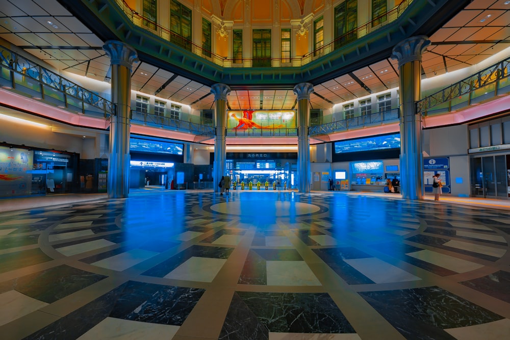 a large indoor mall with a large glass floor