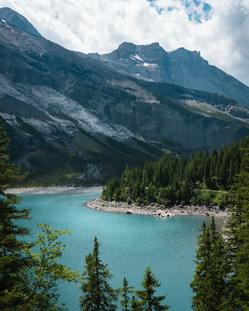 a lake surrounded by mountains