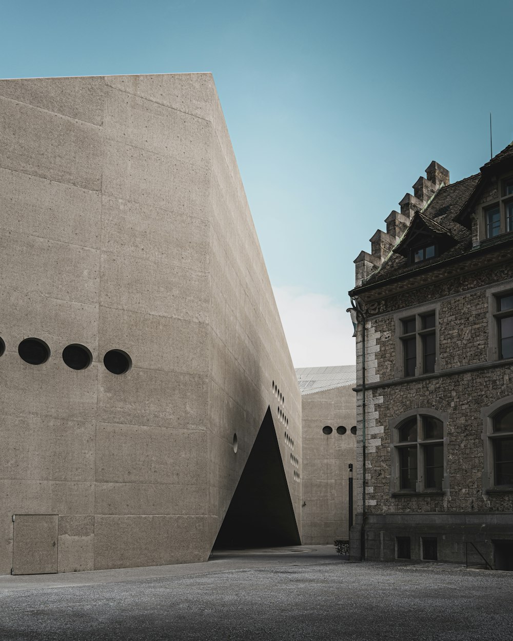 a stone building with a tunnel