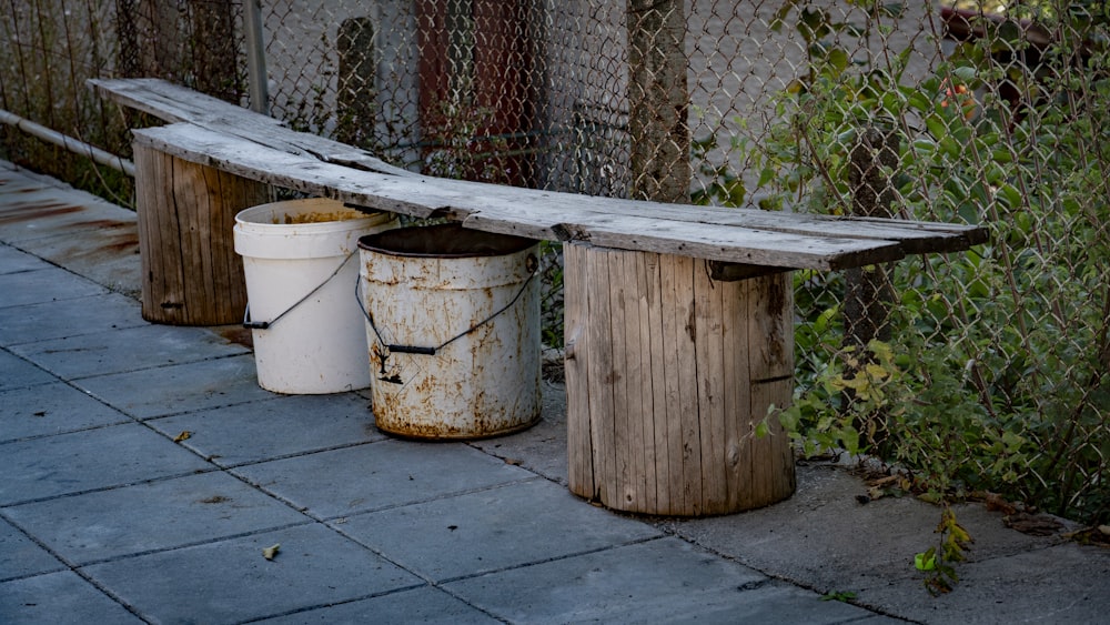 a couple of buckets on a patio