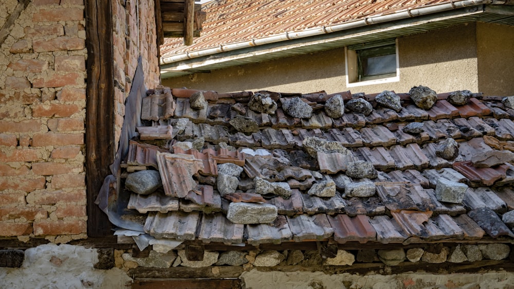 a pile of rocks outside a building