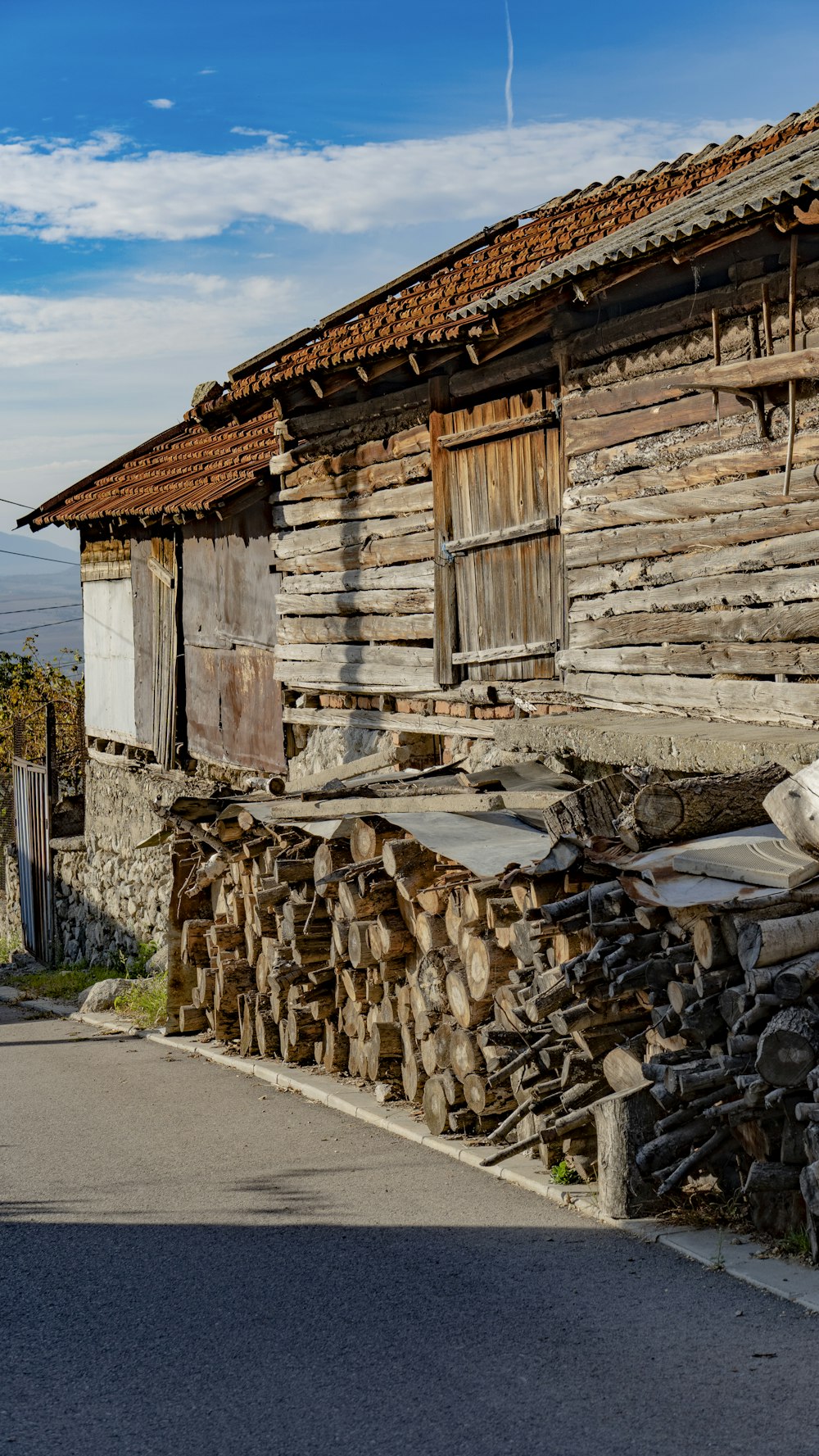 a building with a stone wall