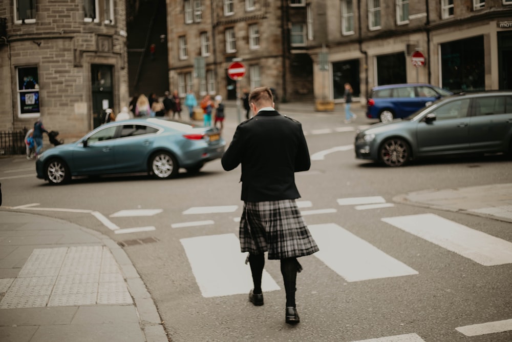 a man walking down a city street