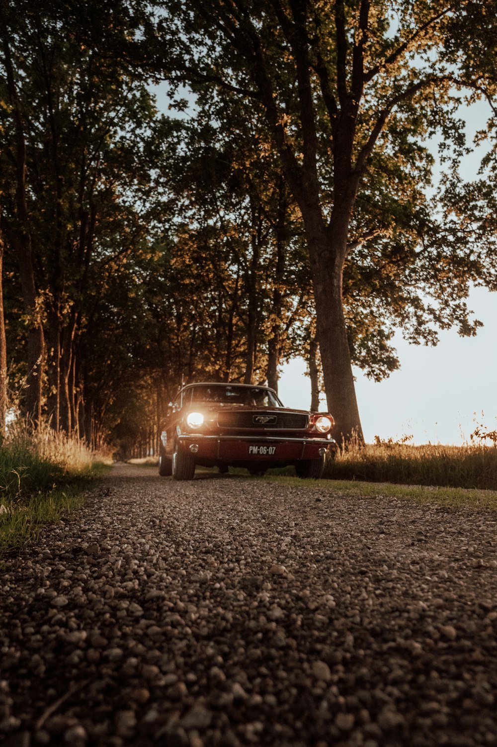 a car parked on a gravel road