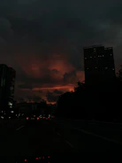 A cinematic shot of a dramatic urban night scene with moody lighting.