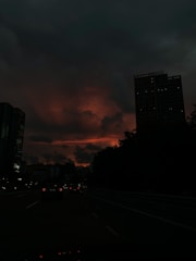 A moody urban scene captured at dusk, showcasing cinematic lighting and depth.