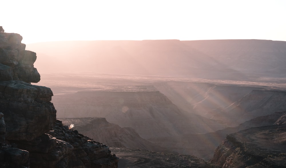 a view of a valley from a cliff