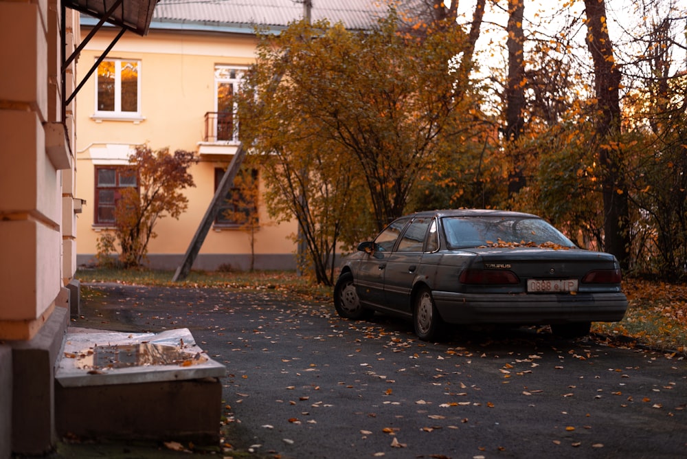 a car parked in front of a house