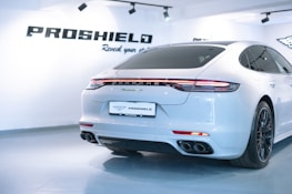 a white car with red stripes