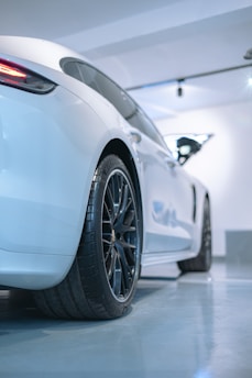 a white car with black rims