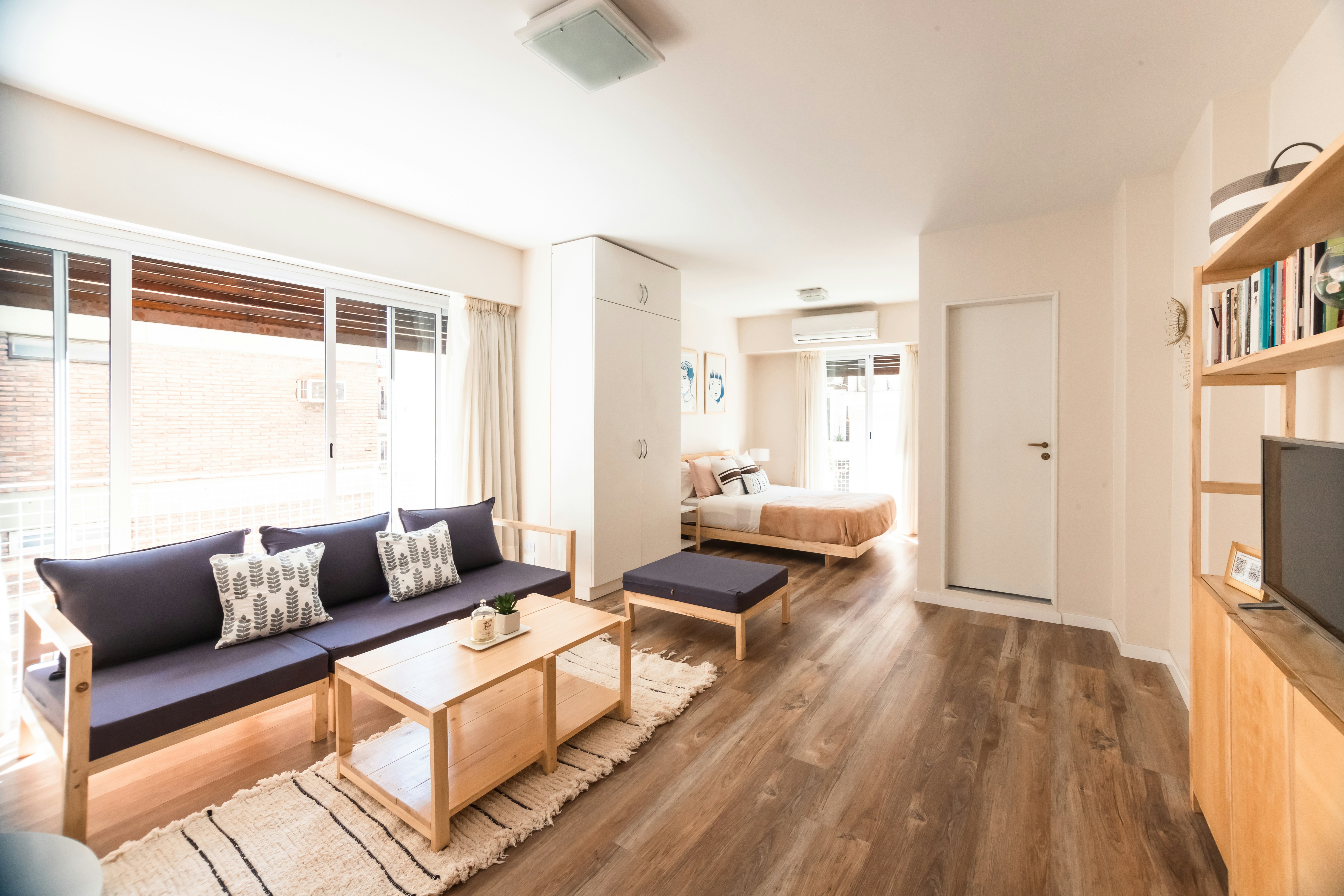 a living room with a couch and a table