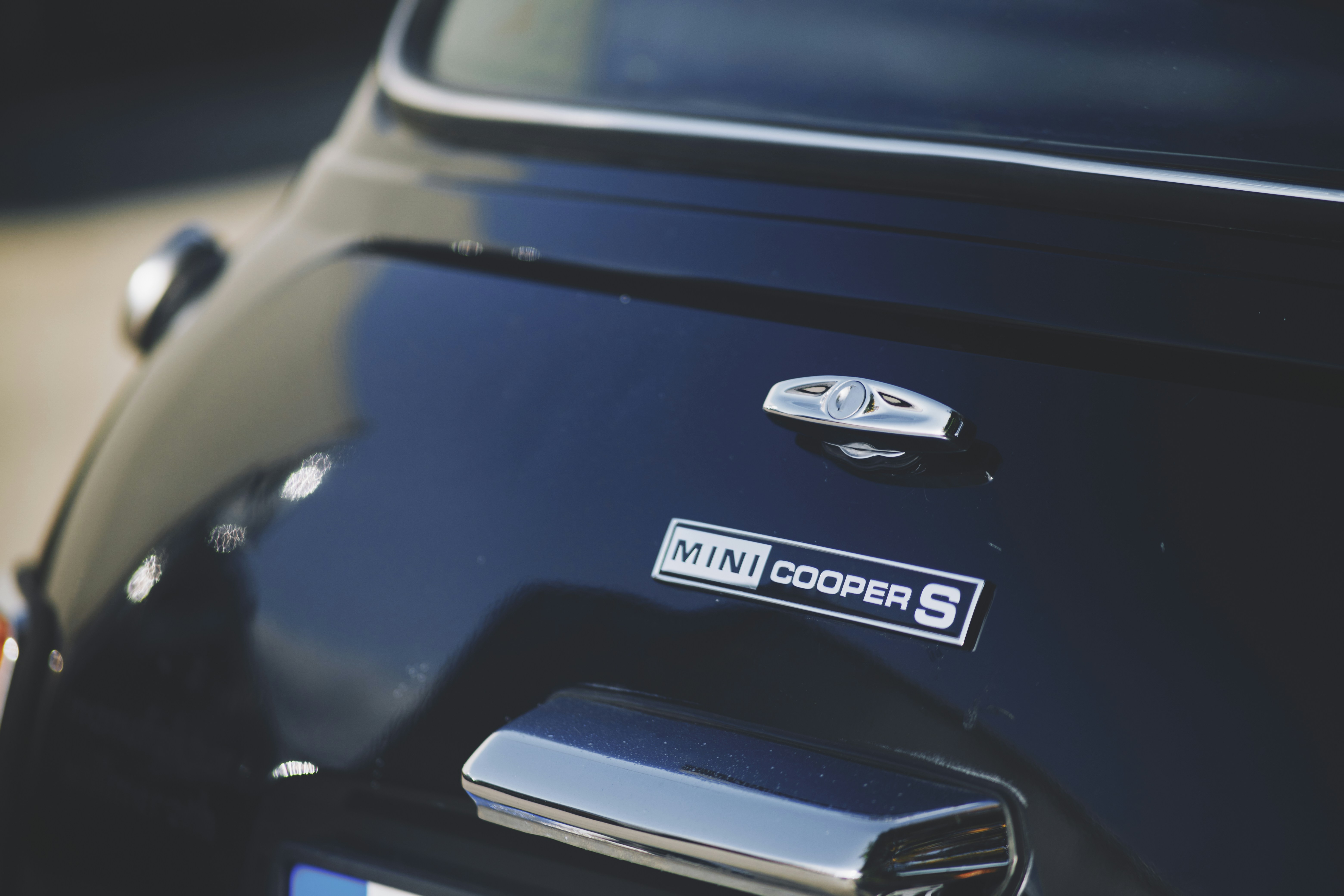 Interior of a modern Mini Cooper SE showing digital instruments and central touchscreen