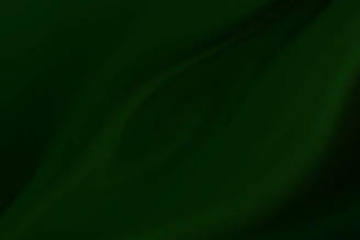 A calming green and gold abstract background evoking spiritual growth.
