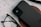 A close-up of a sleek power bank on a desk.