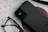 A close-up of a sleek power bank on a desk.