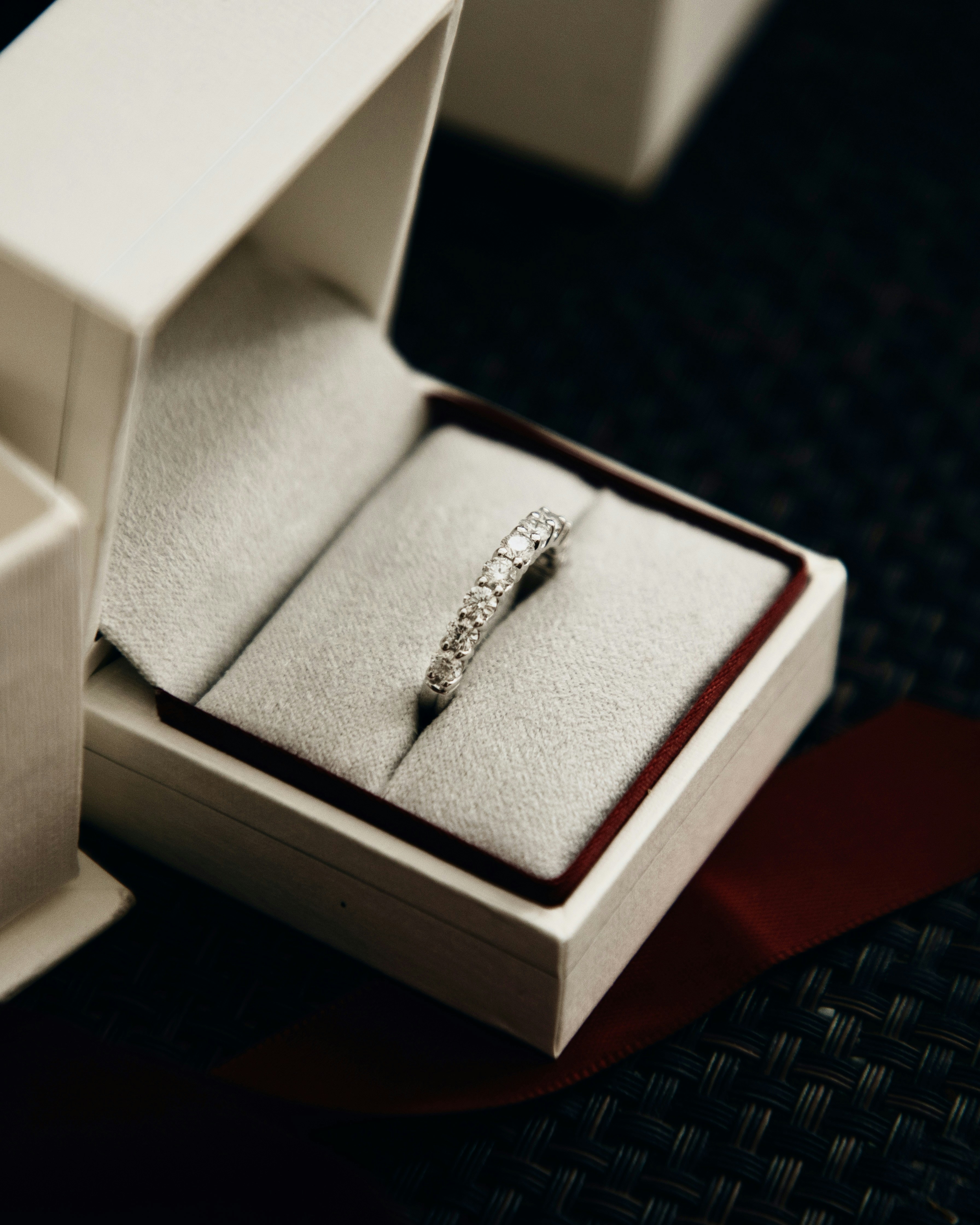 a white box with a red and white stripe on it