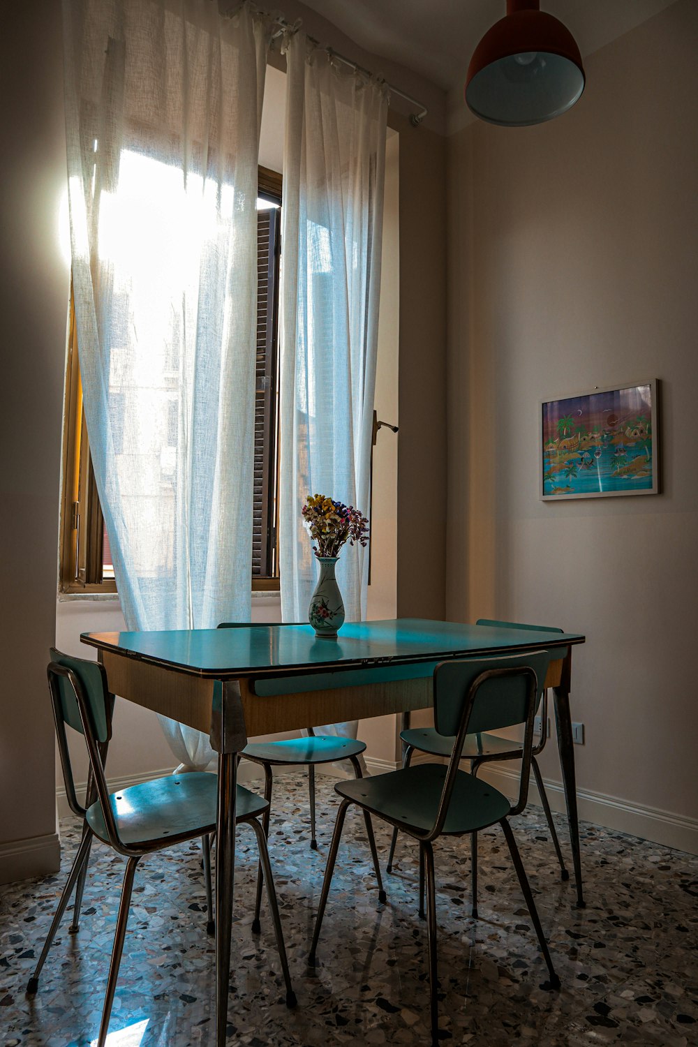 a dining table with chairs around it