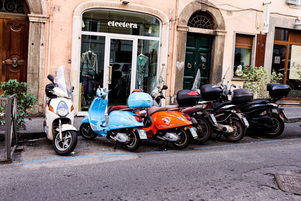 a group of motorcycles parked outside a building