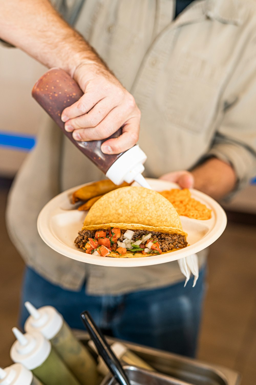 a person cutting a sandwich