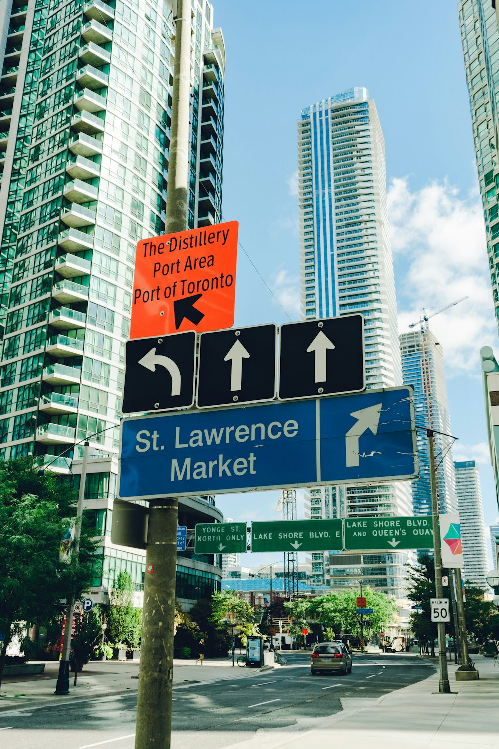 a street sign is posted on the side of a street