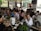 A bustling restaurant with customers enjoying their meals.