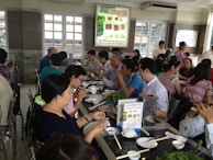 A dynamic shot of a lifestyle scene with people enjoying a meal.