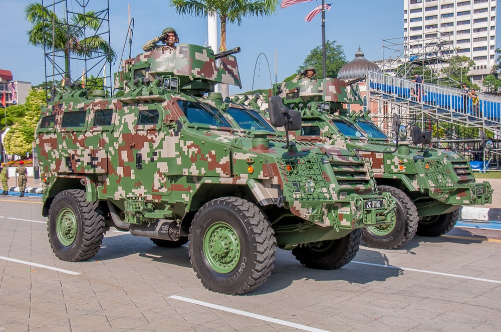 a military vehicle parked in a parking lot
