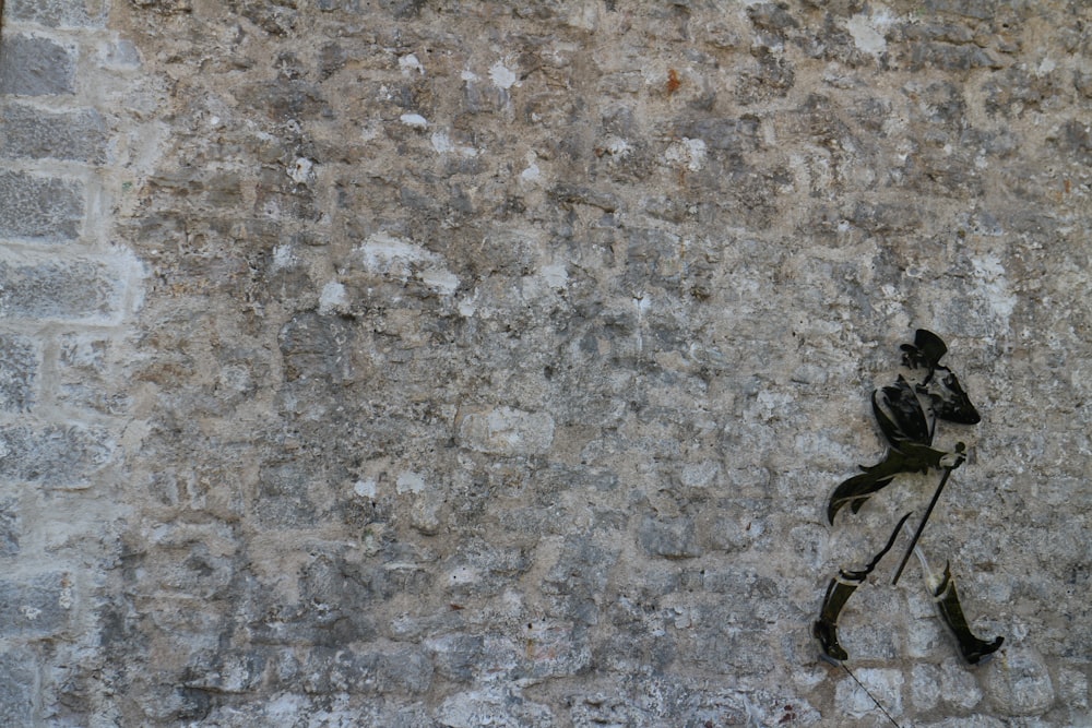 a person climbing a rock wall