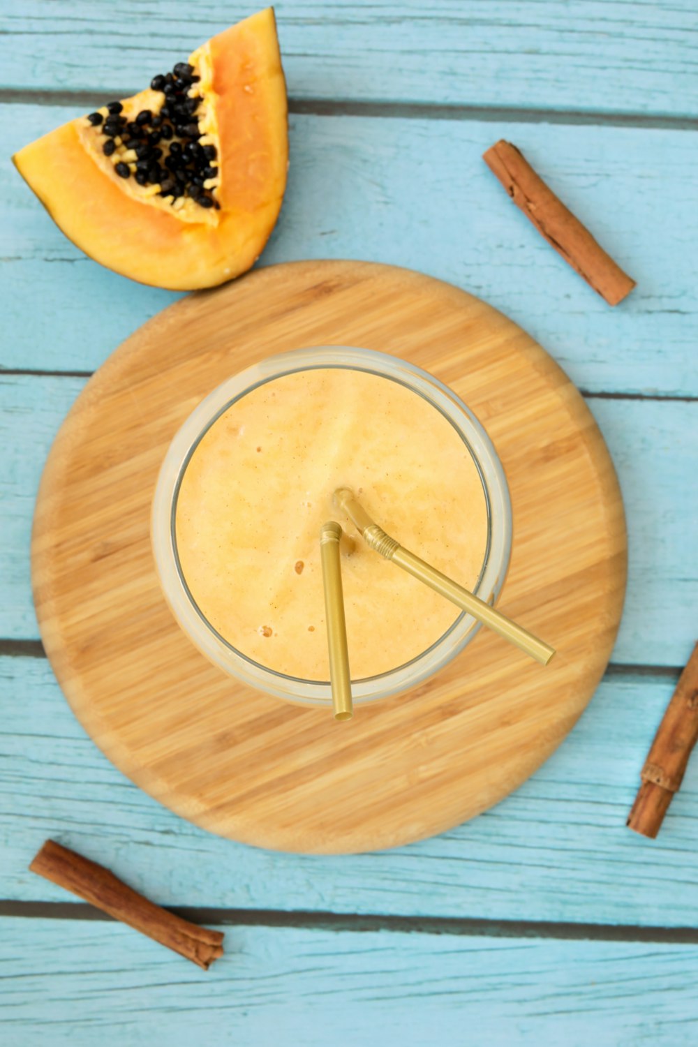 a wooden cutting board with a piece of food on it
