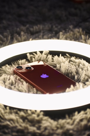 a cell phone on a blanket