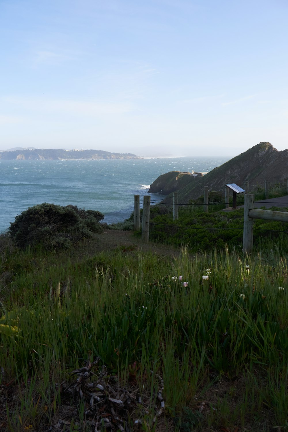 a fence near a body of water