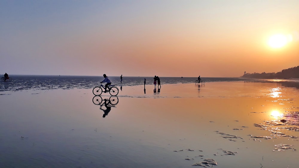 a group of people on a beach