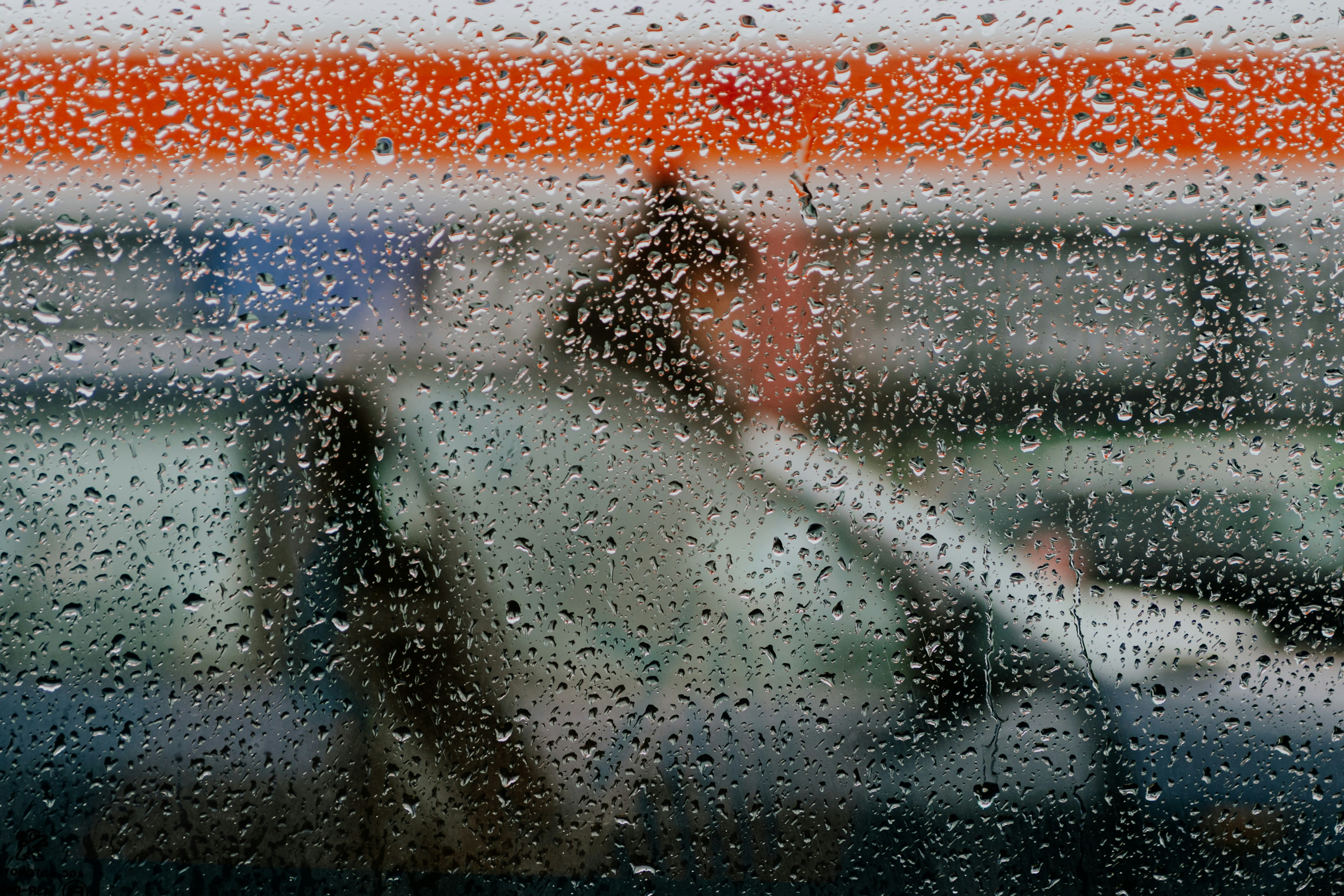 a window with rain drops on it