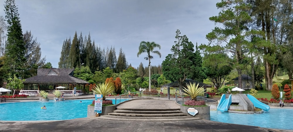 a pool with a building in the background