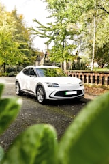 a white car parked on a road