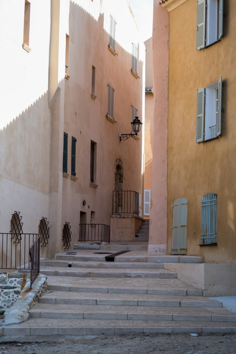 a stone staircase between two buildings