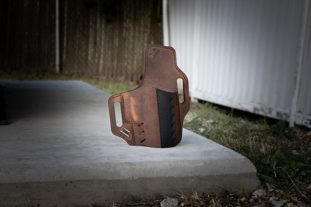 a metal object on a concrete surface