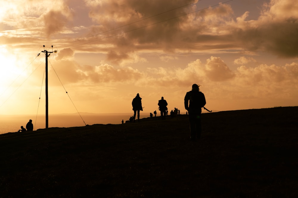 people on a hill